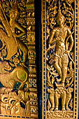 Luang Prabang, Laos - Wat Pa Phai the 'Bamboo Forest Monastery', detail of the doorways of the facade. 